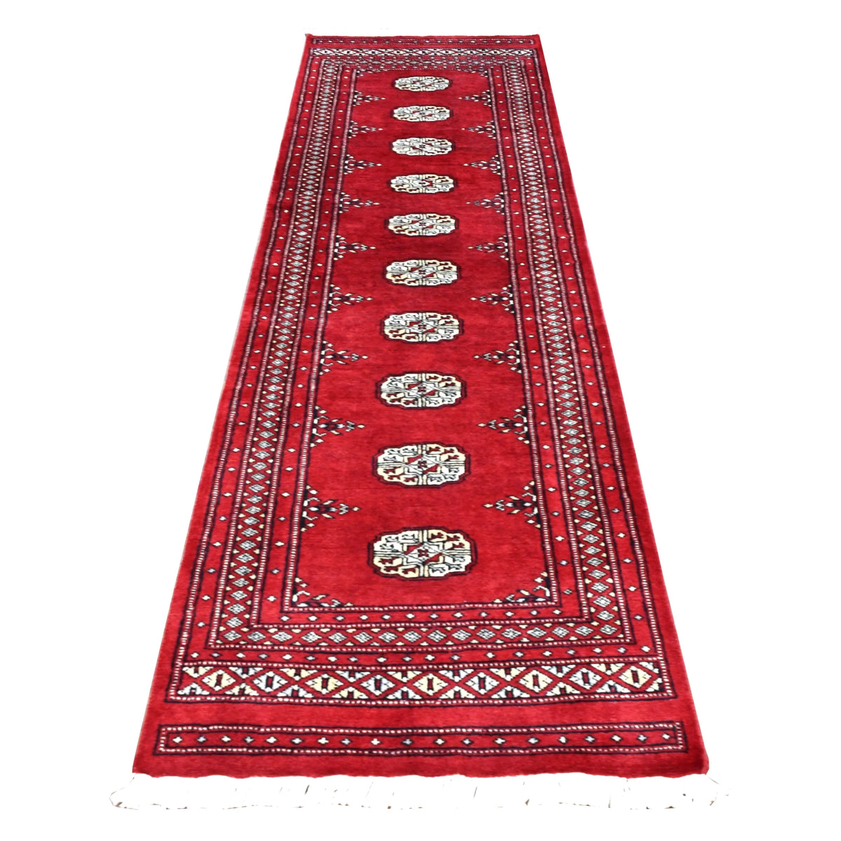 Full view of Afghan Bokhara runner rug with ten ivory guls in a row on a rich red field and layered geometric borders, 256 x 78 cm