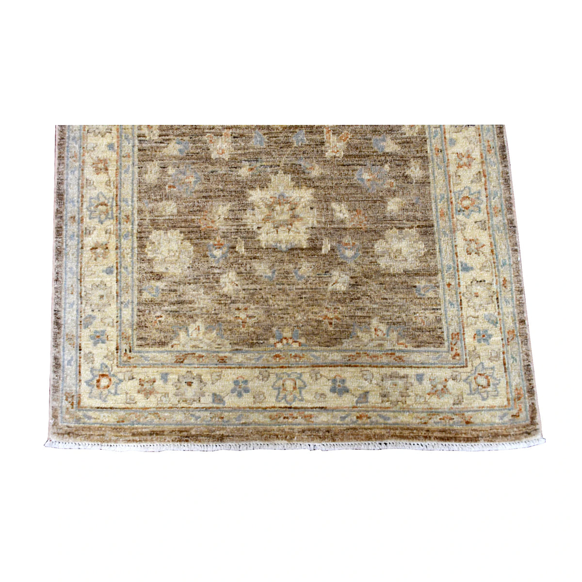Fringe-end detail of Afghan Chobi runner showing its pale botanical border around the taupe floral field and white fringe