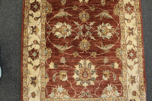 Afghan Chobi hand-knotted wool rug 133 x 85 cm field and border detail