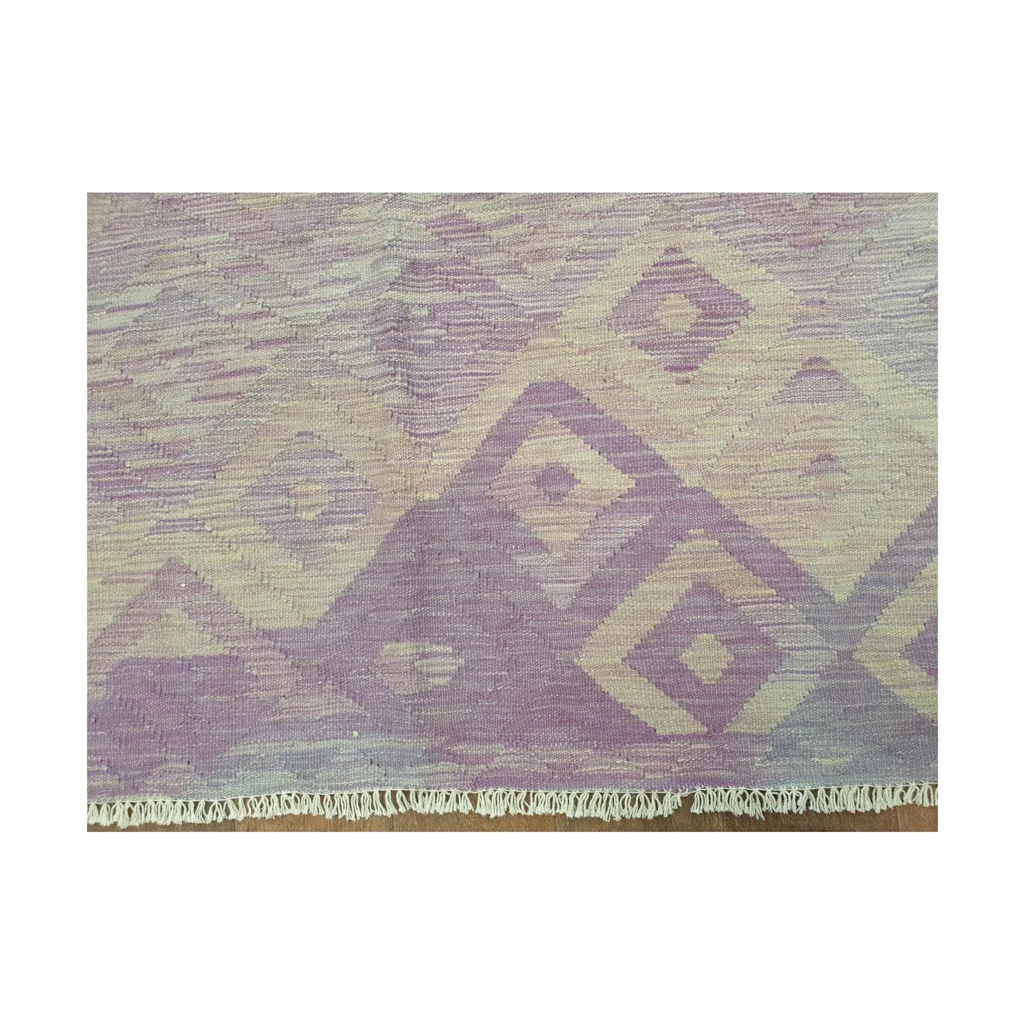 Pattern detail of Afghan Chobi Kilim purple diamond rug showing muted geometric motifs
