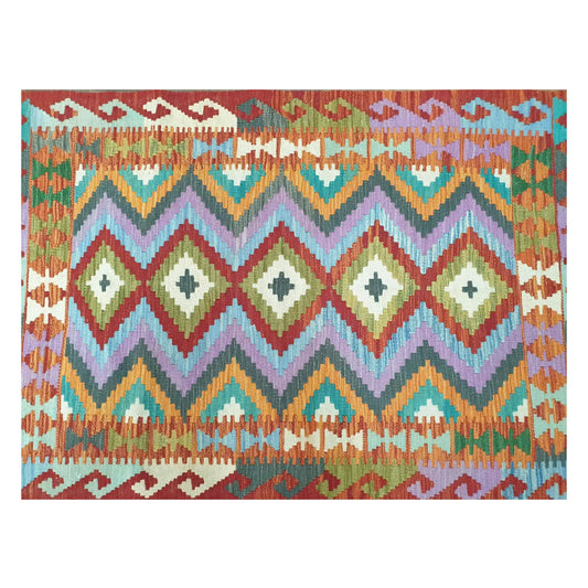 Pattern detail of Afghan Chobi Kilim rug showing orange, teal and ivory motifs