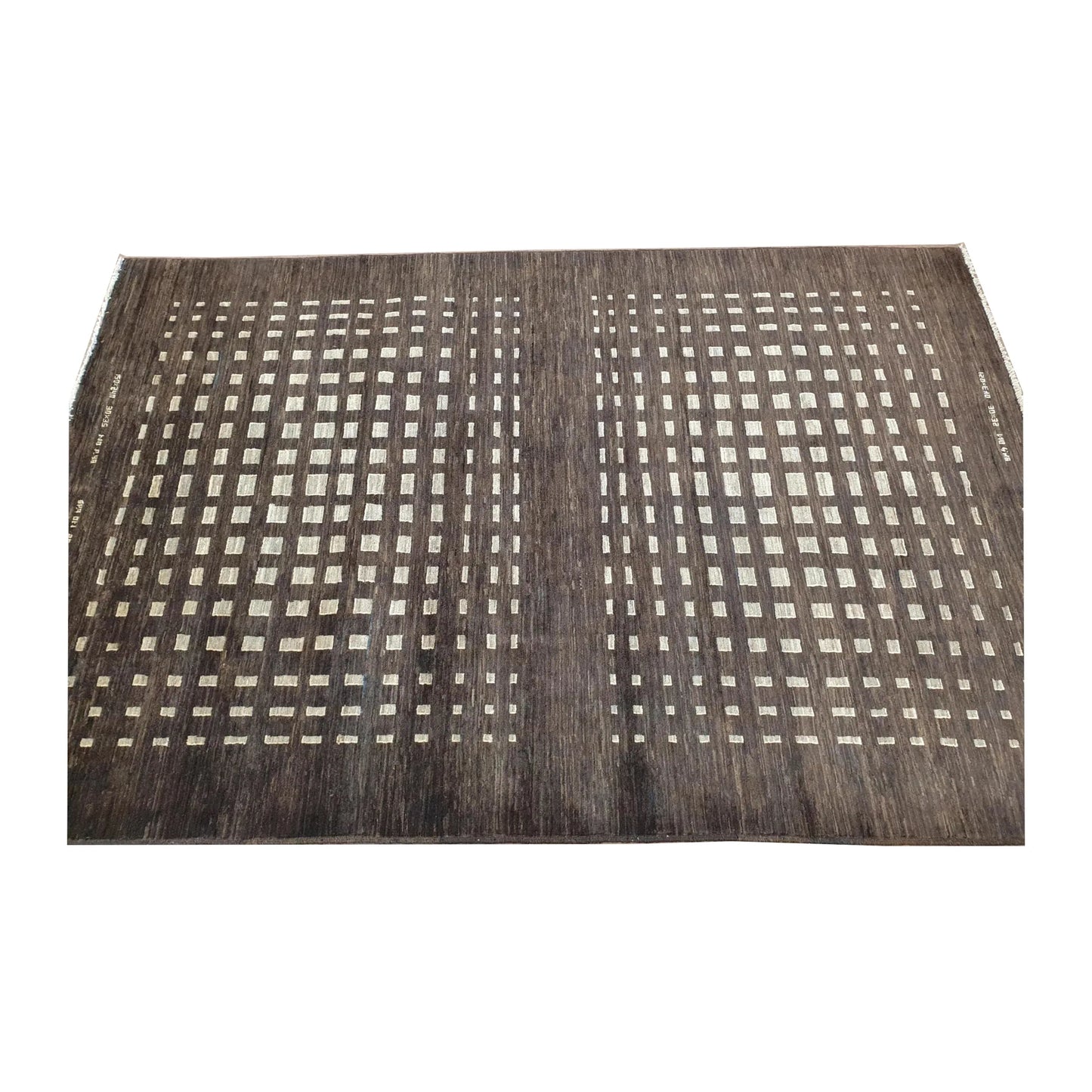 Fringe-end perspective view of Afghan Gabbeh natural wool rug showing the dark brown field and ivory square lattice pattern