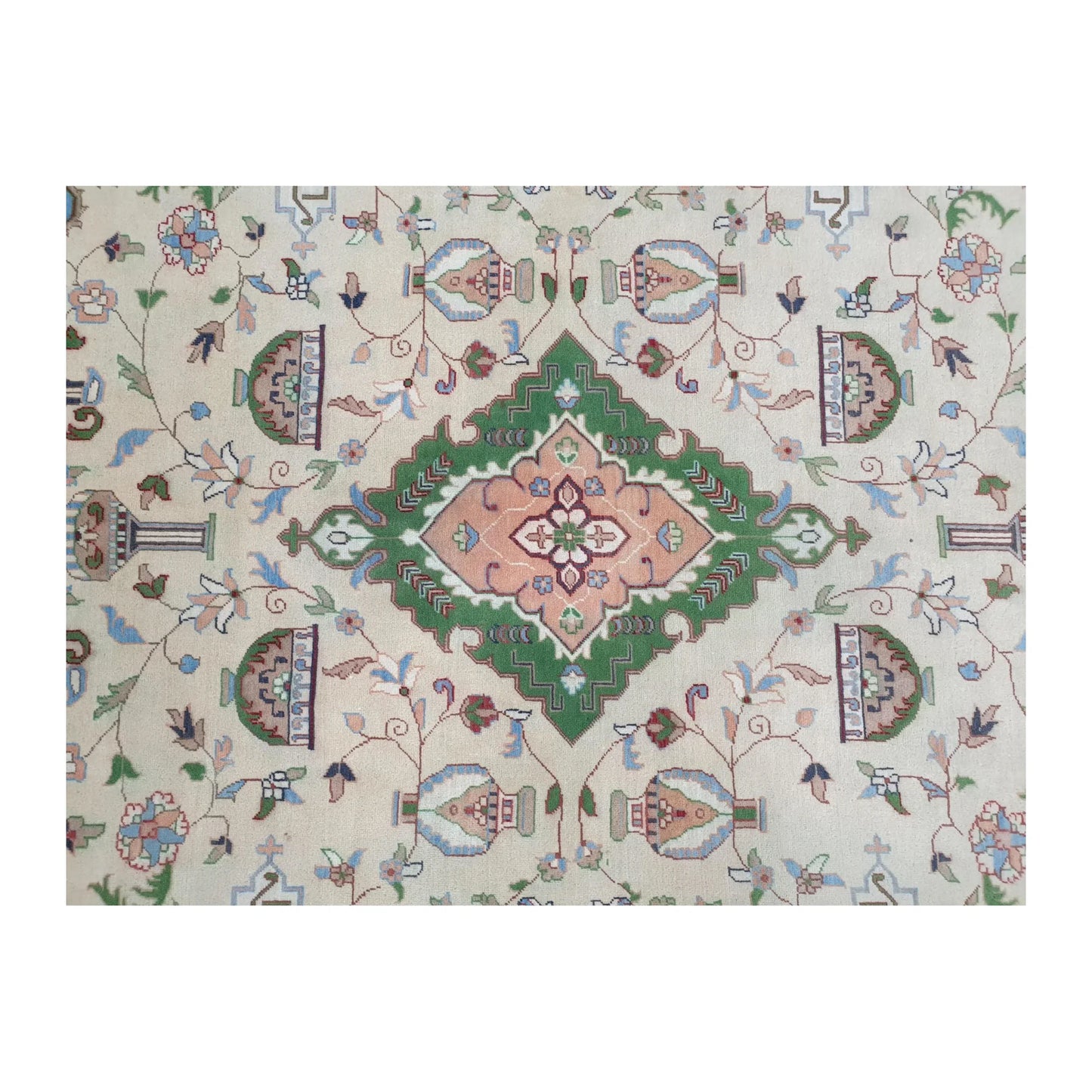 Central medallion detail of Afghan Karghai wool rug in green, blush pink and beige tones, 298 x 202 cm