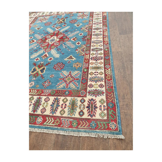 Border and fringe detail of Afghan Kazak hand-knotted wool rug with cream and red pattern
