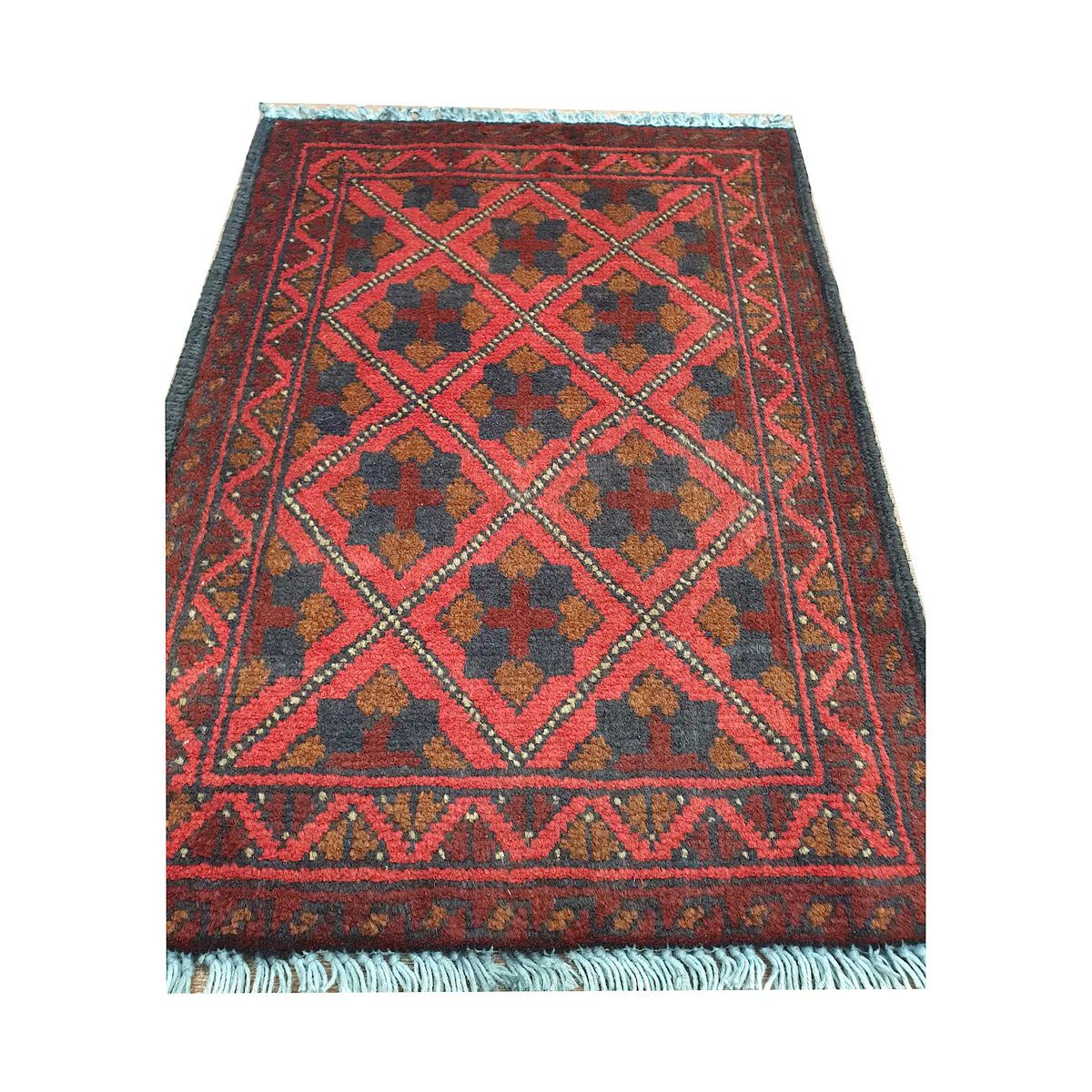 Afghan Khal Mohammadi wool rug detail showing red diamond lattice field with floral tribal motifs