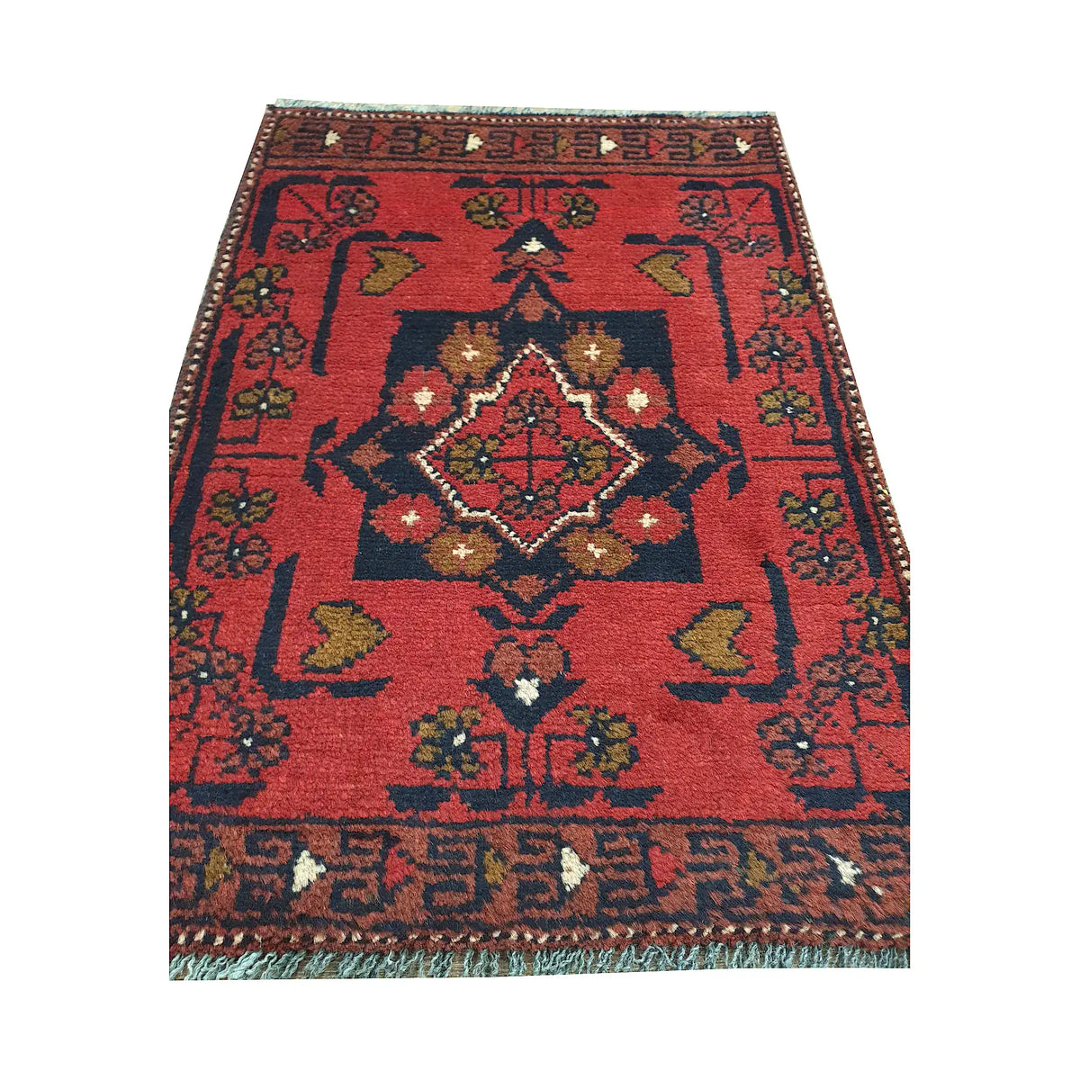 Afghan Khal Mohammadi wool rug detail showing central diamond medallion, red field and traditional tribal pattern