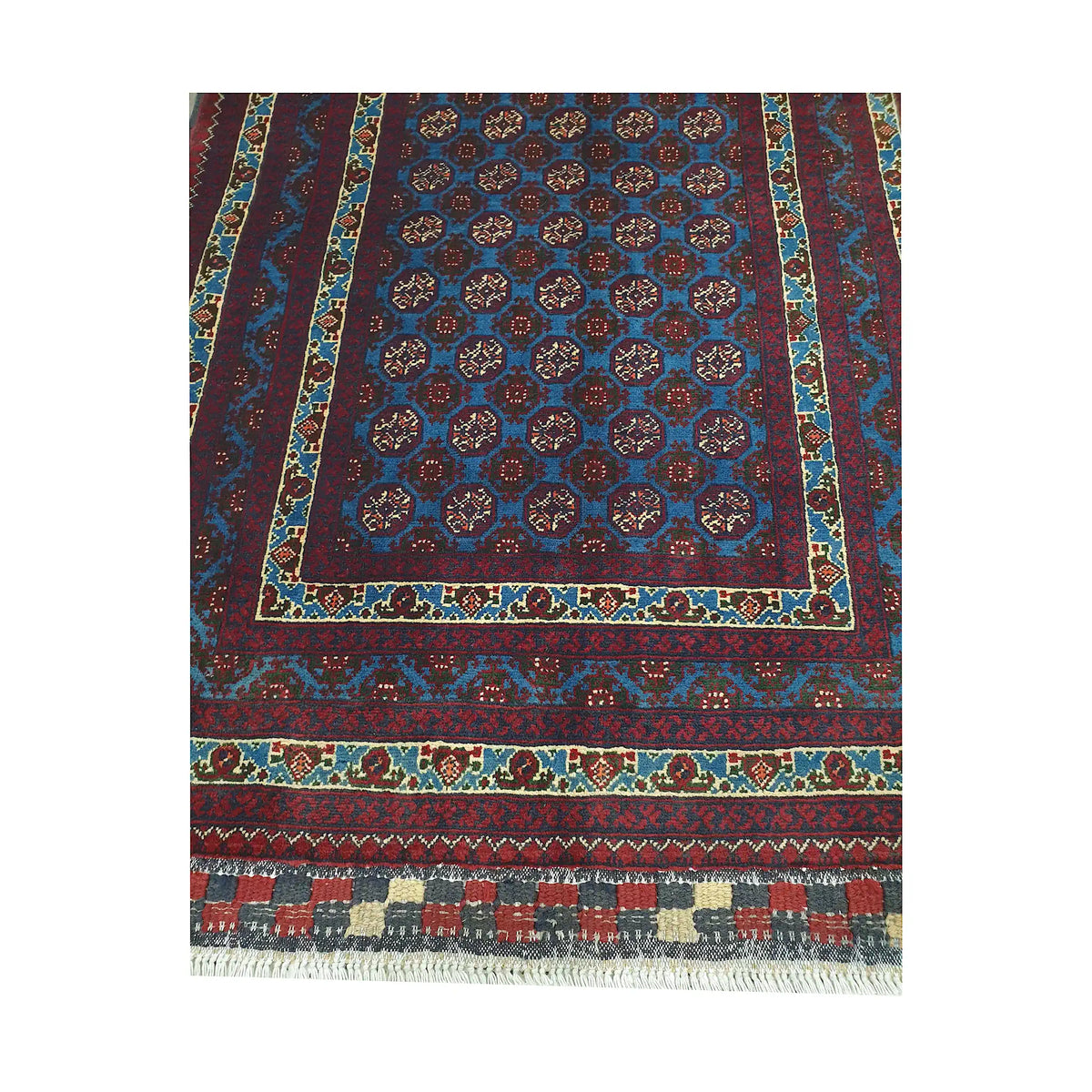 End field and fringe detail of Afghan Roshnai runner rug with blue medallion field and patterned burgundy border