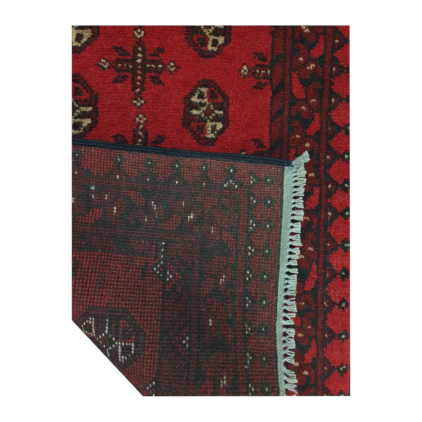 Reverse-weave and fringe detail of Afghan Turkoman wool runner rug showing back structure and hand-knotted pattern