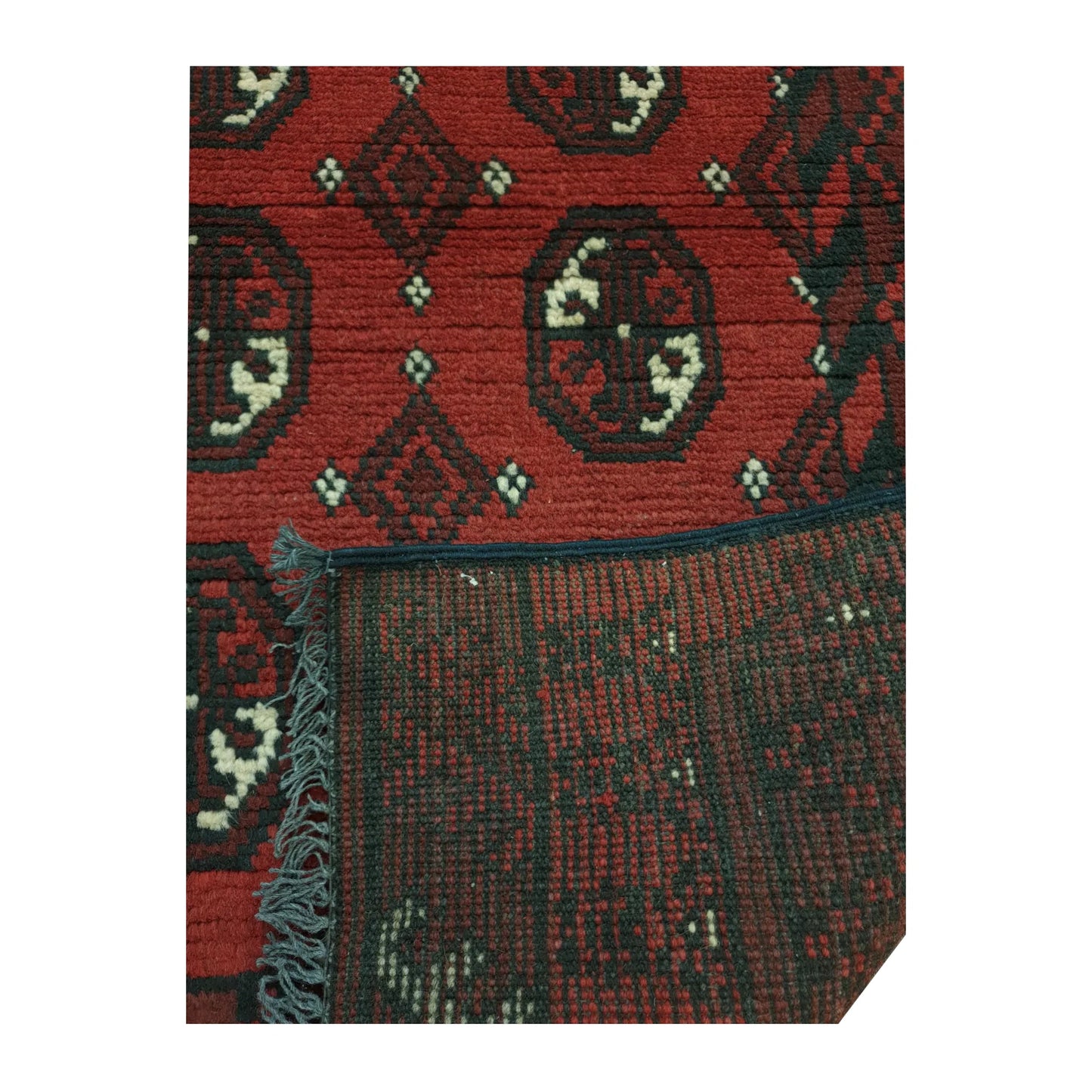 Reverse weave detail of Afghan Turkoman hand-knotted wool runner rug showing back construction and edge finish