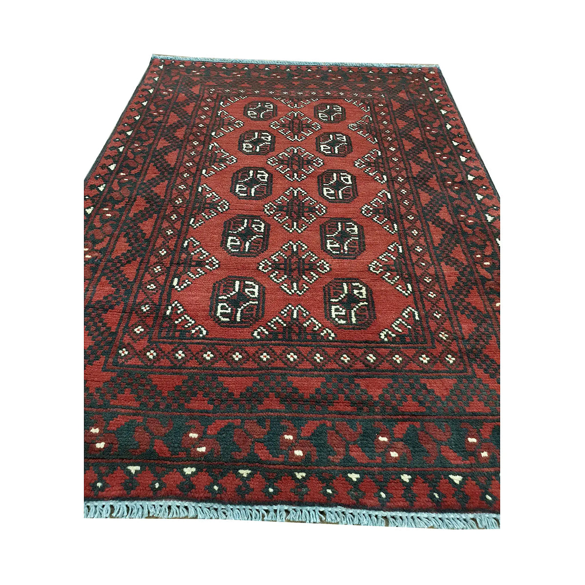 End field and fringe detail of Afghan Turkoman rug with red ground, gul medallions and dark tribal border
