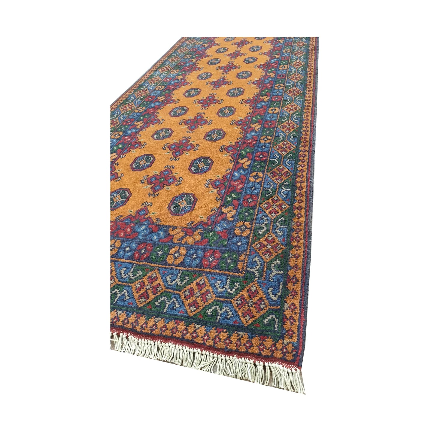 Corner and border detail of Afghan Turkoman runner rug showing fringe, golden field and blue-red geometric border