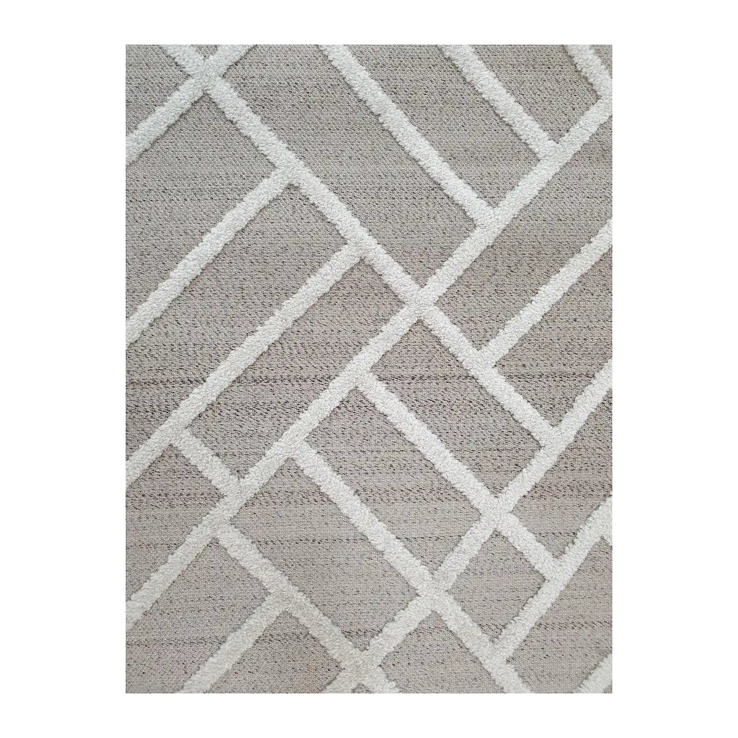Close-up of Archer Beige Runner Rug showing raised ivory geometric lattice pattern on beige polyester surface