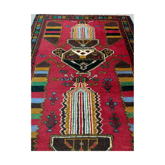 Baluchi fine hand-knotted wool rug top motif detail