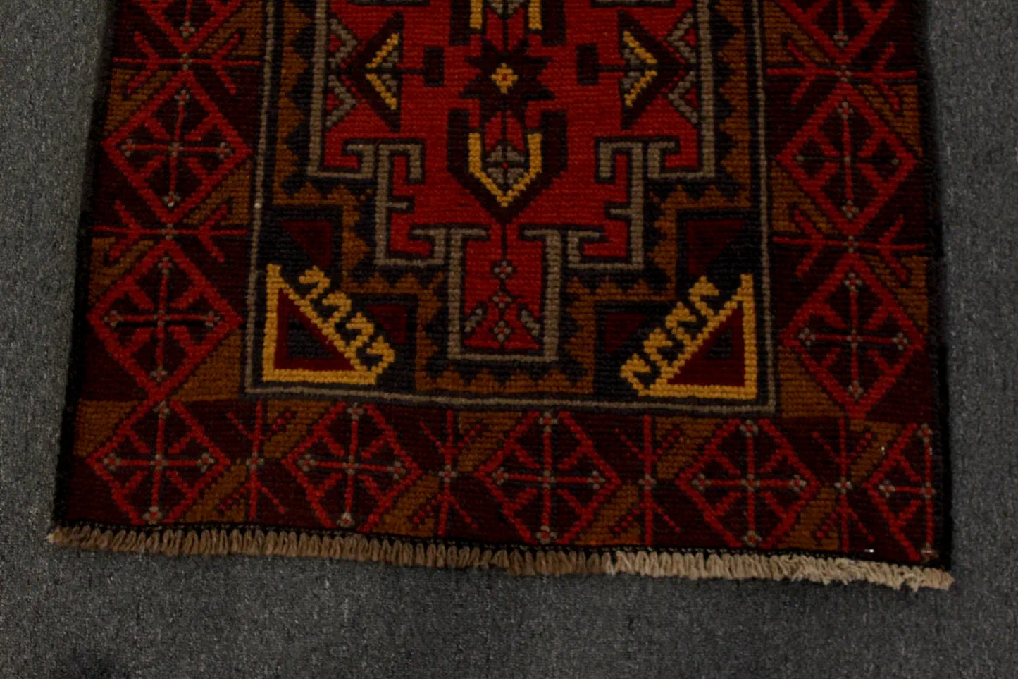 Baluchi rug lower border detail