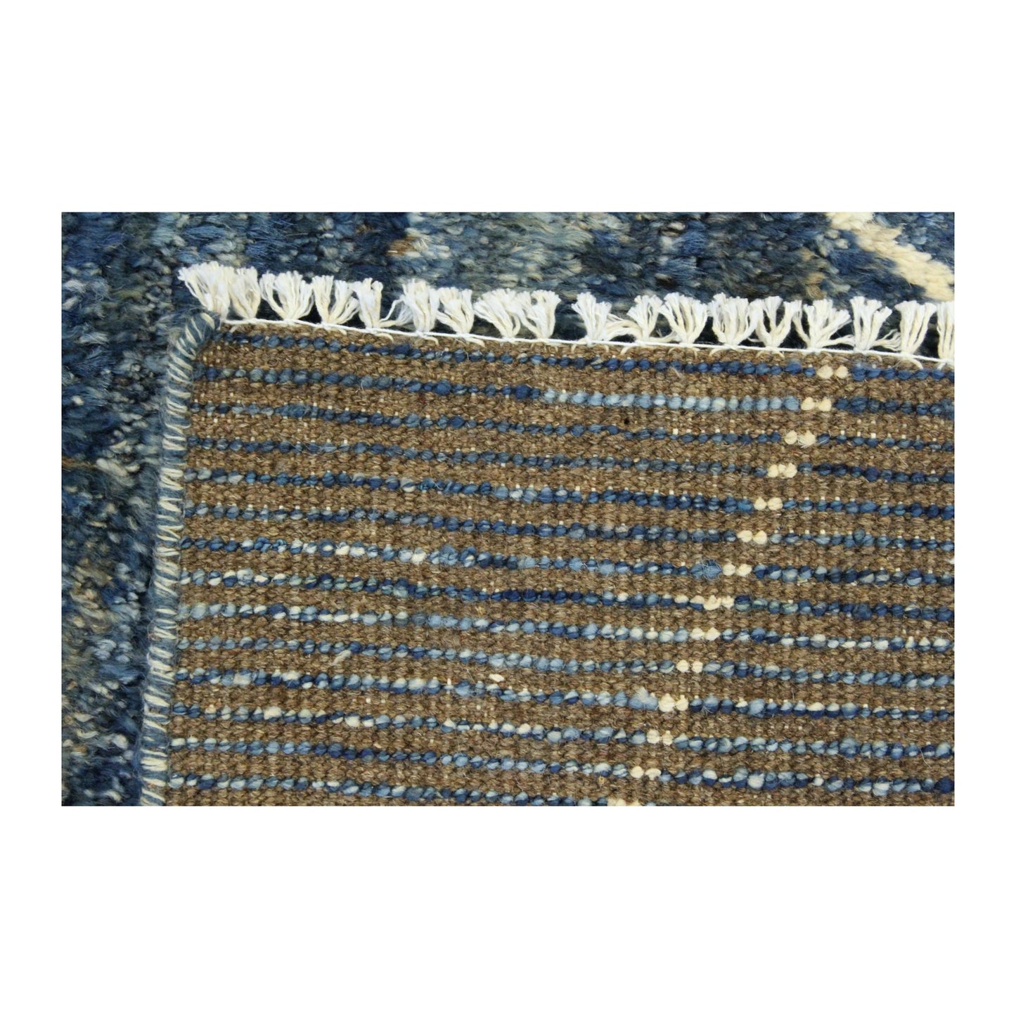 Reverse weave detail of Moroccan hand-knotted wool rug with fringe, 180 x 140 cm