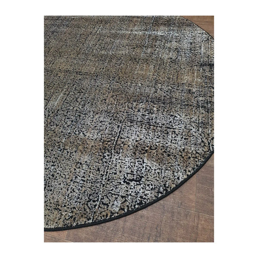 Angled detail of gold and taupe round rug showing textured pattern and edge finish, 160 cm