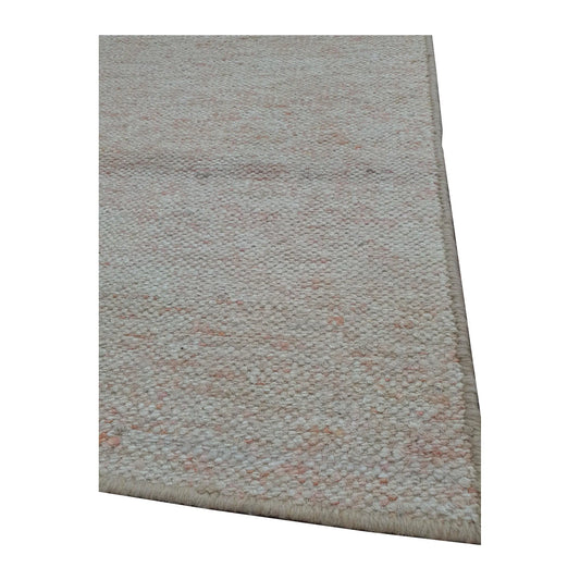 Edge detail of Indian Dhurrie runner showing off-white flatweave texture with subtle pale peach variation