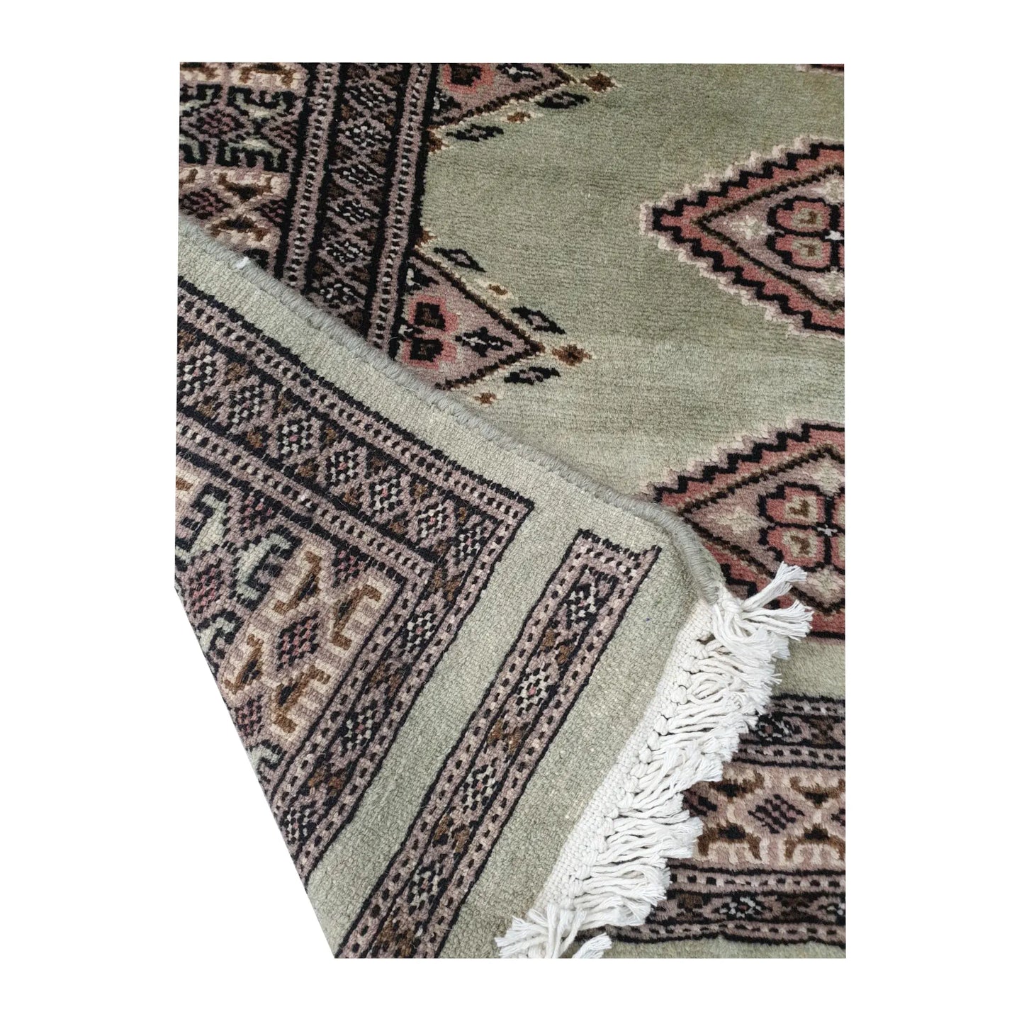 Reverse weave detail of Jaldar Silk Touch hand-knotted wool runner rug showing back construction and edge finish