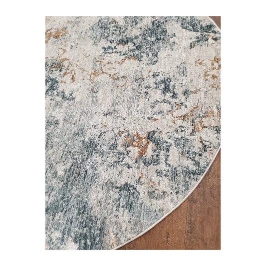 Angled detail of light gray round rug showing abstract pattern and edge finish, 160 cm