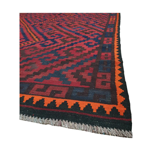 Angled fringe and border detail of Mamina Kilim wool rug showing red, navy, charcoal and orange flatwoven pattern