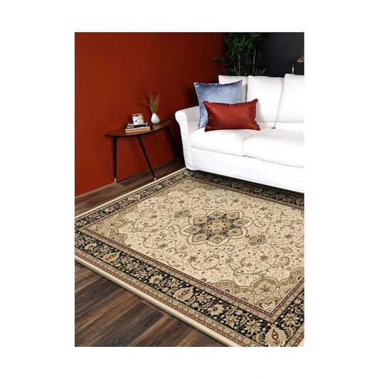 Styled room view of the Turkish Isfahan cream rug showing its pale floral field and dark ornamental border