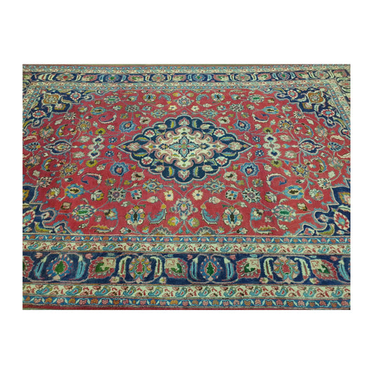 Upper border and field detail of Vintage Mashad wool rug with rose-red floral field and deep navy border, 290 x 186 cm