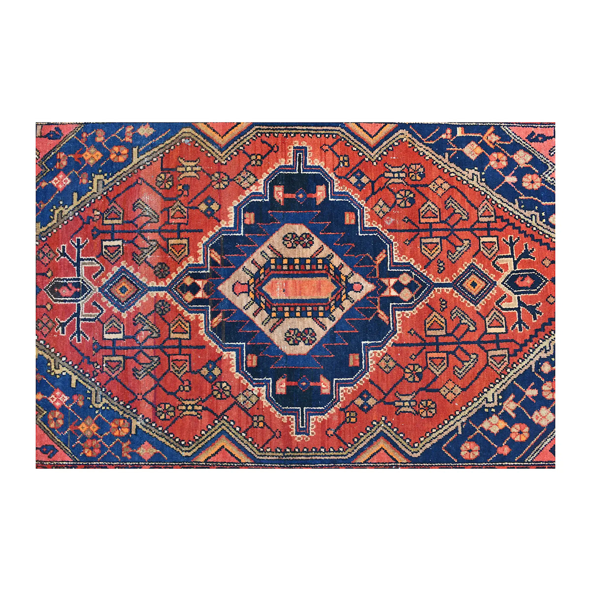 Field detail of Persian Zanjan rug showing a stepped central medallion, angular floral forms and navy corner spandrels
