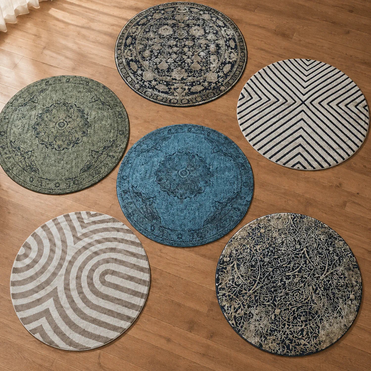 Aerial view of multiple patterned round rugs displayed on a wooden floor