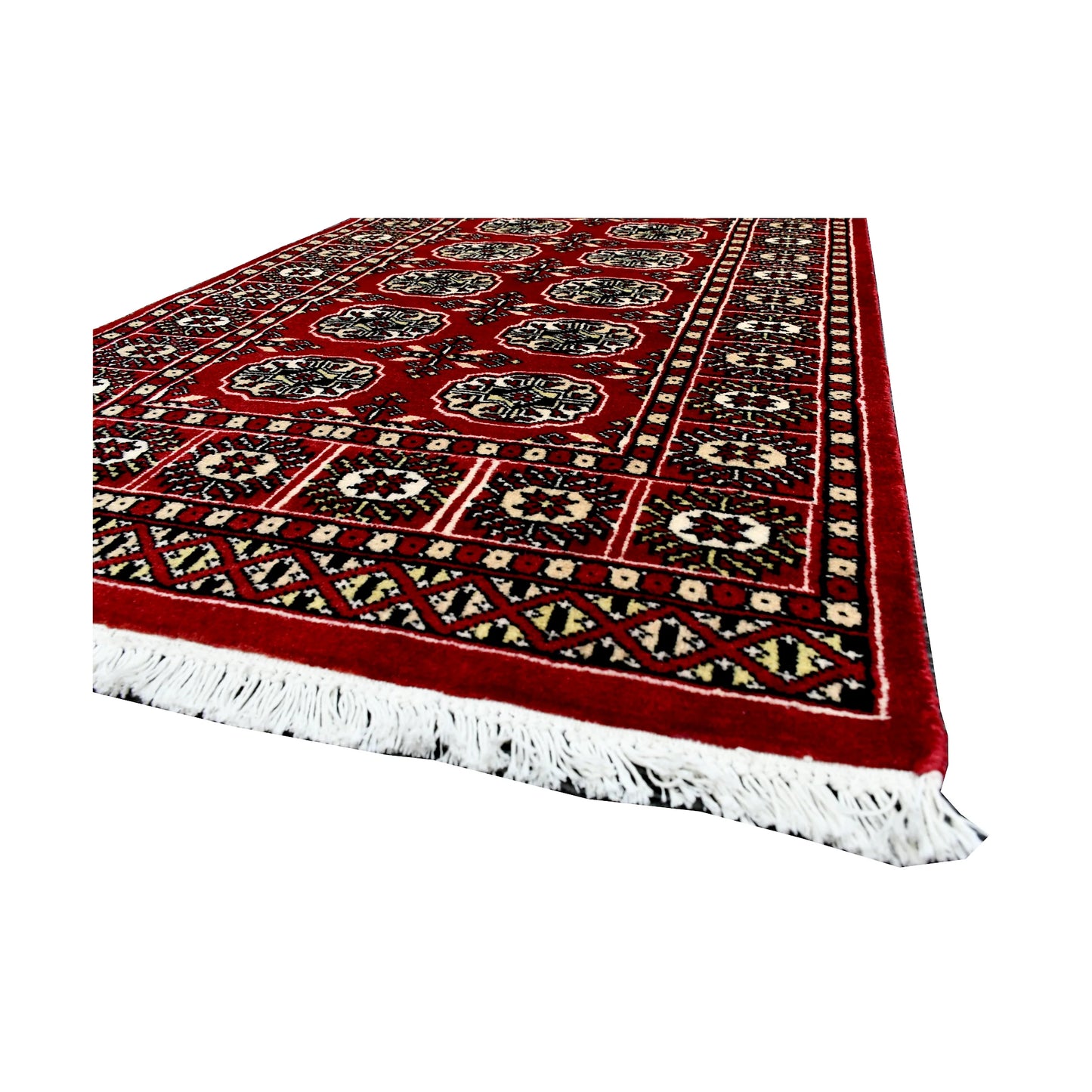 Angled fringe and edge detail of Afghan Bokhara runner rug showing red field, black border and wool texture