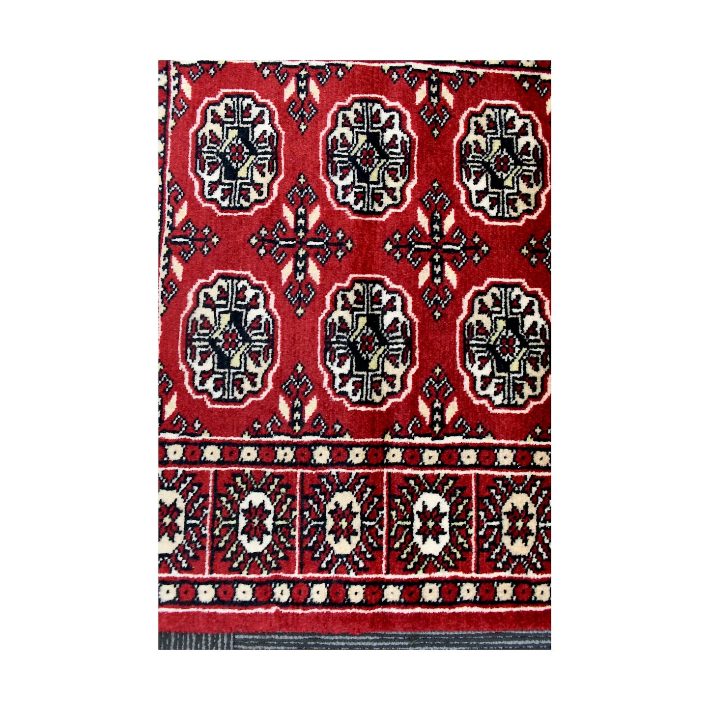 Gul medallion and border detail of Afghan Bokhara runner rug with red, black and ivory geometric pattern