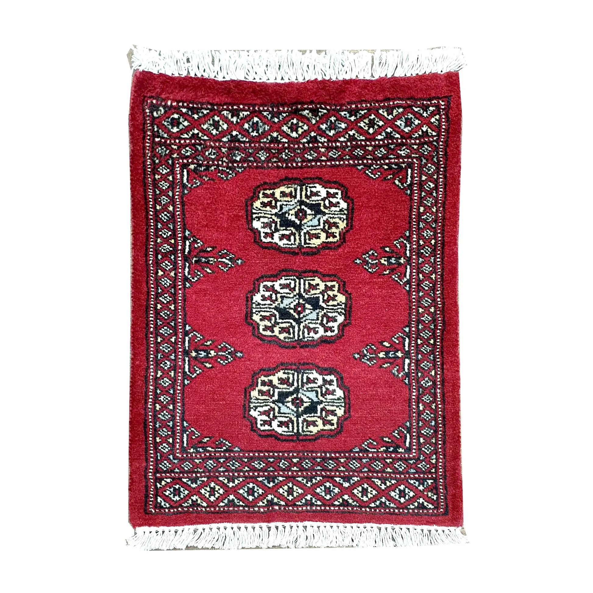 Afghan Bokhara wool rug 61 x 48 cm full view with red field, ivory gul medallions and fringe