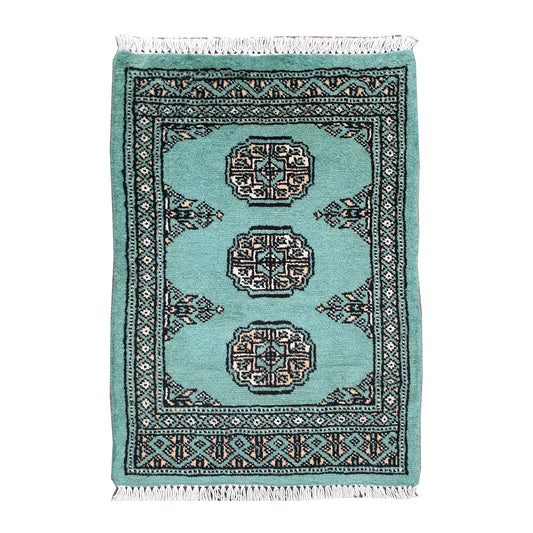 Afghan Bokhara wool rug 66 x 47 cm full view with light turquoise field, ivory gul medallions and fringe