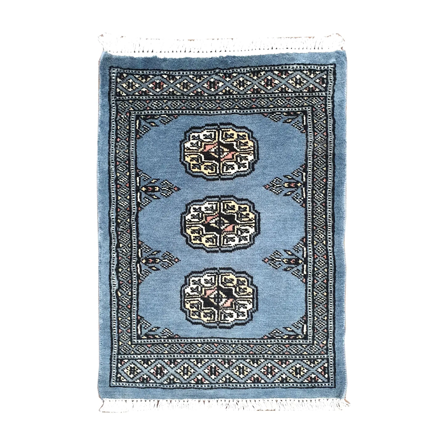 Afghan Bokhara wool rug 67 x 47 cm full view with blue-grey field, ivory gul medallions and fringe