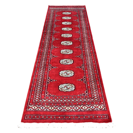 Full view of Afghan Bokhara runner rug with ten ivory guls in a row on a rich red field and layered geometric borders, 256 x 78 cm