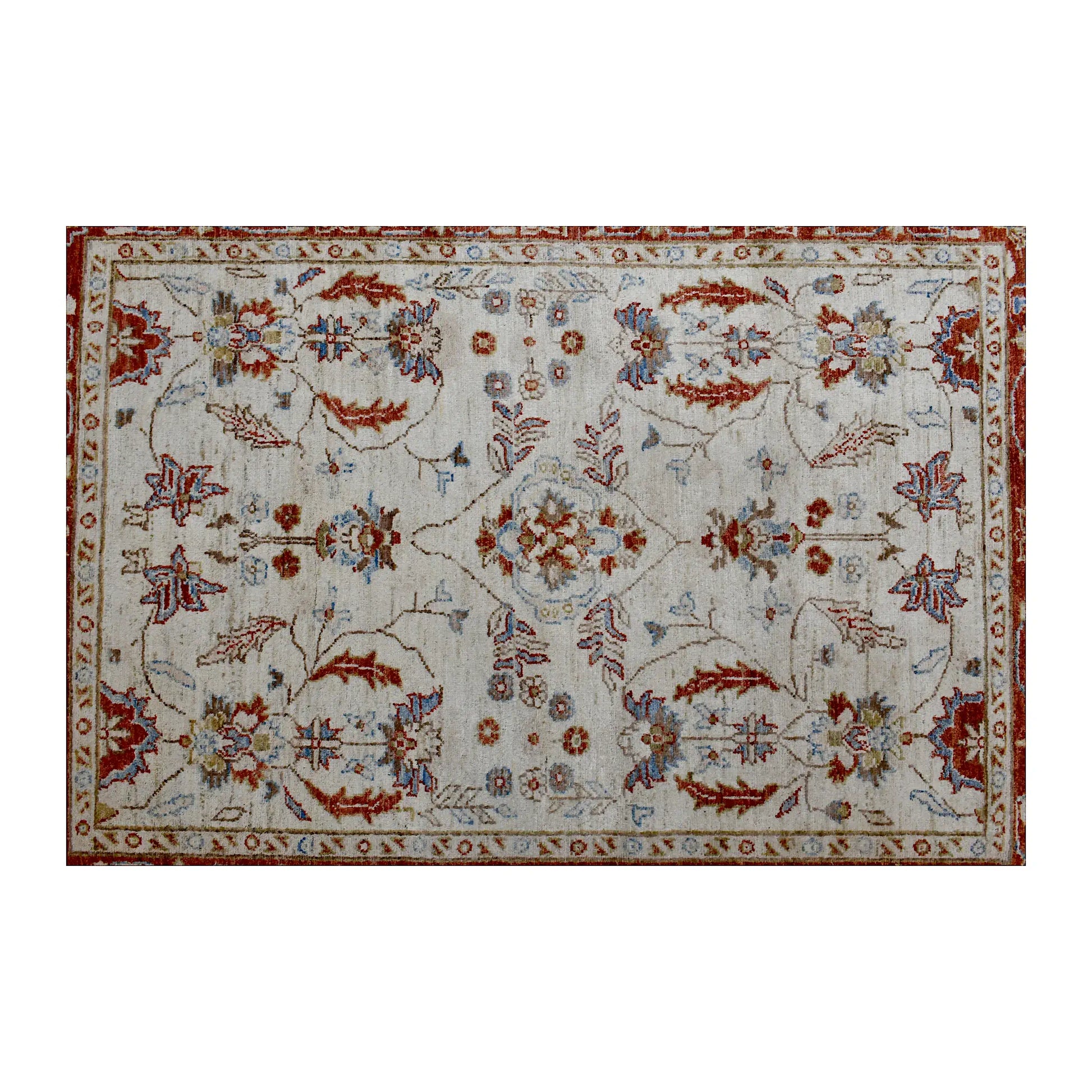 Floral field view of Afghan Chobi rug showing its symmetrical vine pattern, warm border and pale blue details
