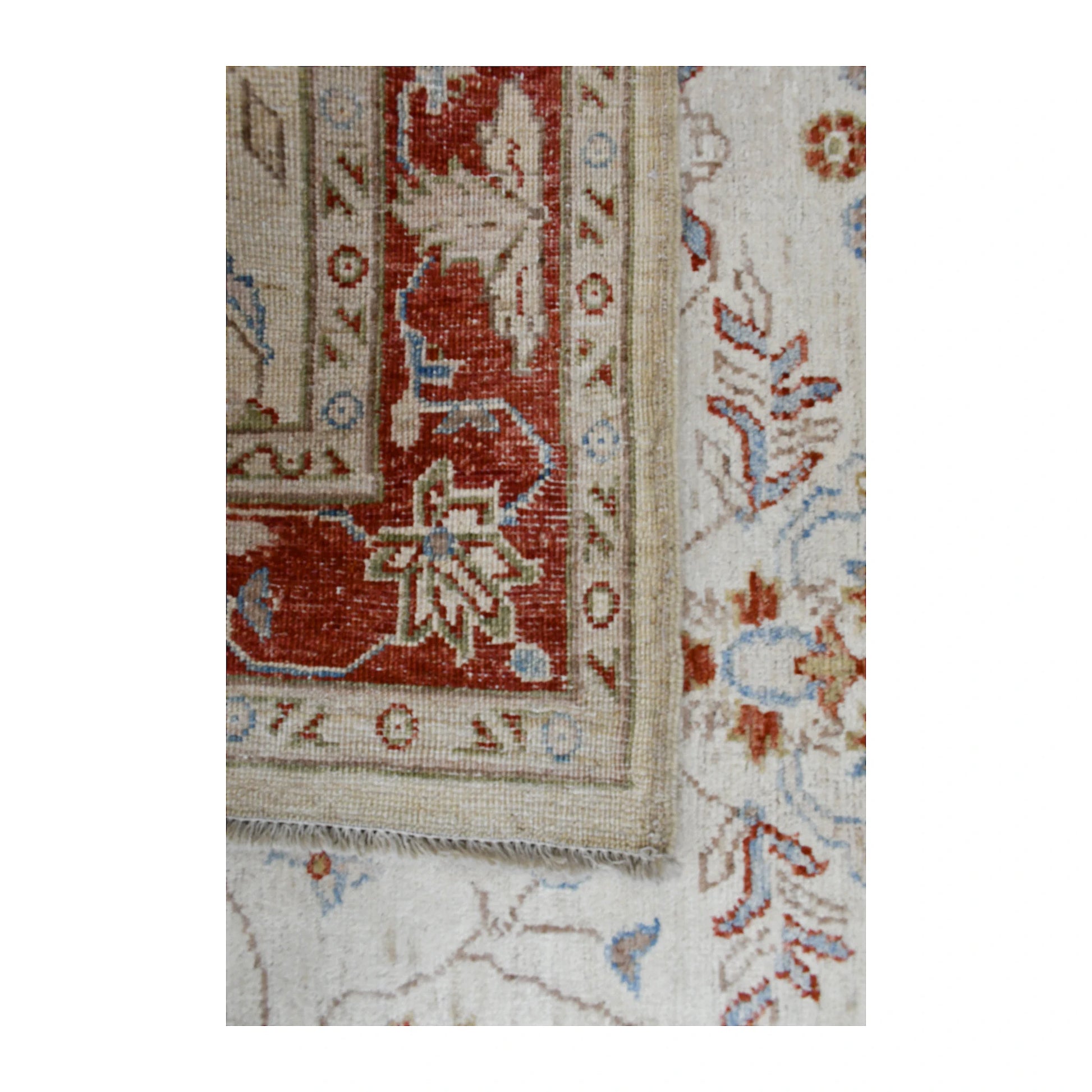 Folded-corner detail of Afghan Chobi rug showing the front pattern, reverse weave and finished edge
