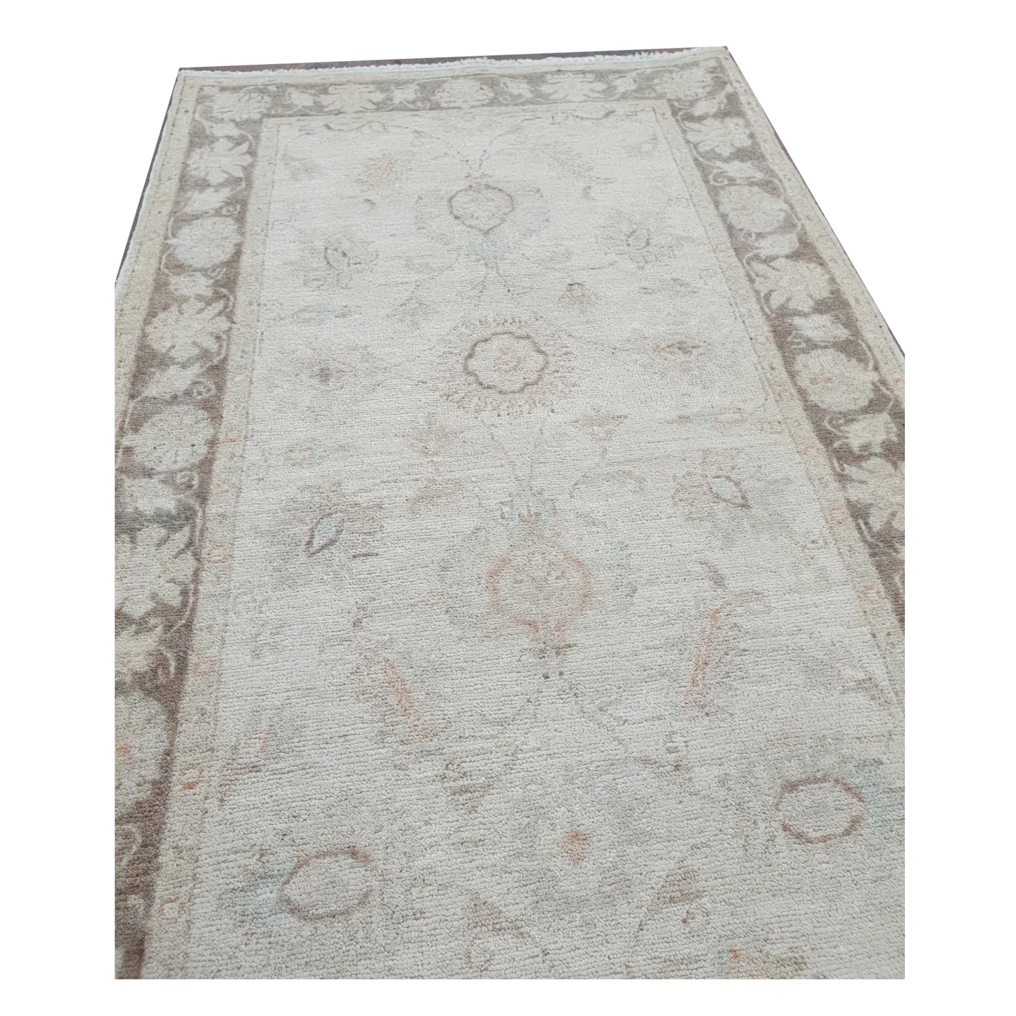 End detail of Afghan Chobi beige floral runner showing border and floral pattern