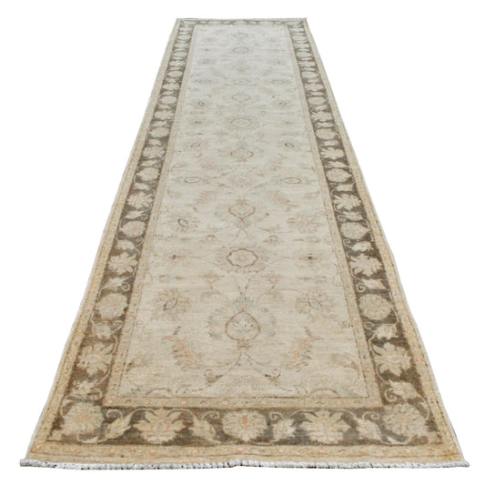 Full view of Afghan Chobi runner with a warm beige floral field and taupe border of repeating ivory blossoms, 290 x 79 cm