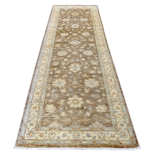 Full view of Afghan Chobi runner with repeating pale floral medallions on a taupe-brown field and ivory border, 292 x 92 cm