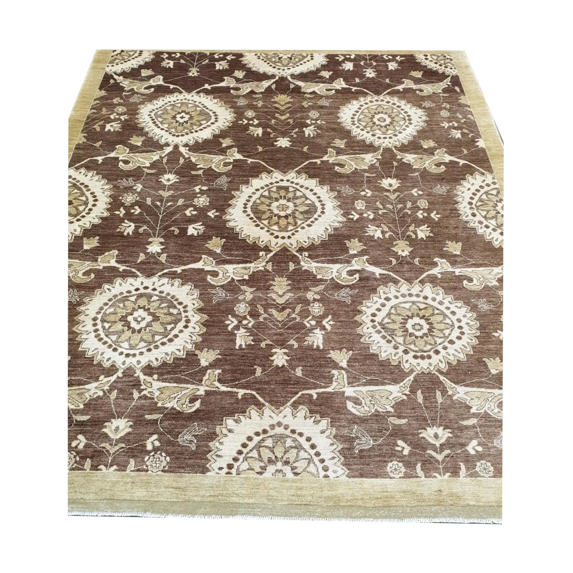 Border detail of Afghan Chobi brown floral rug showing beige wool pattern and fringe