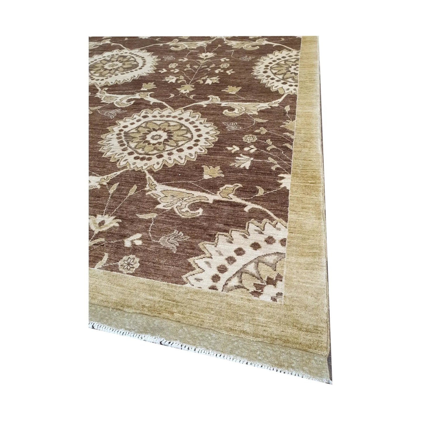 Side detail of Afghan Chobi brown floral rug showing floral border and field pattern