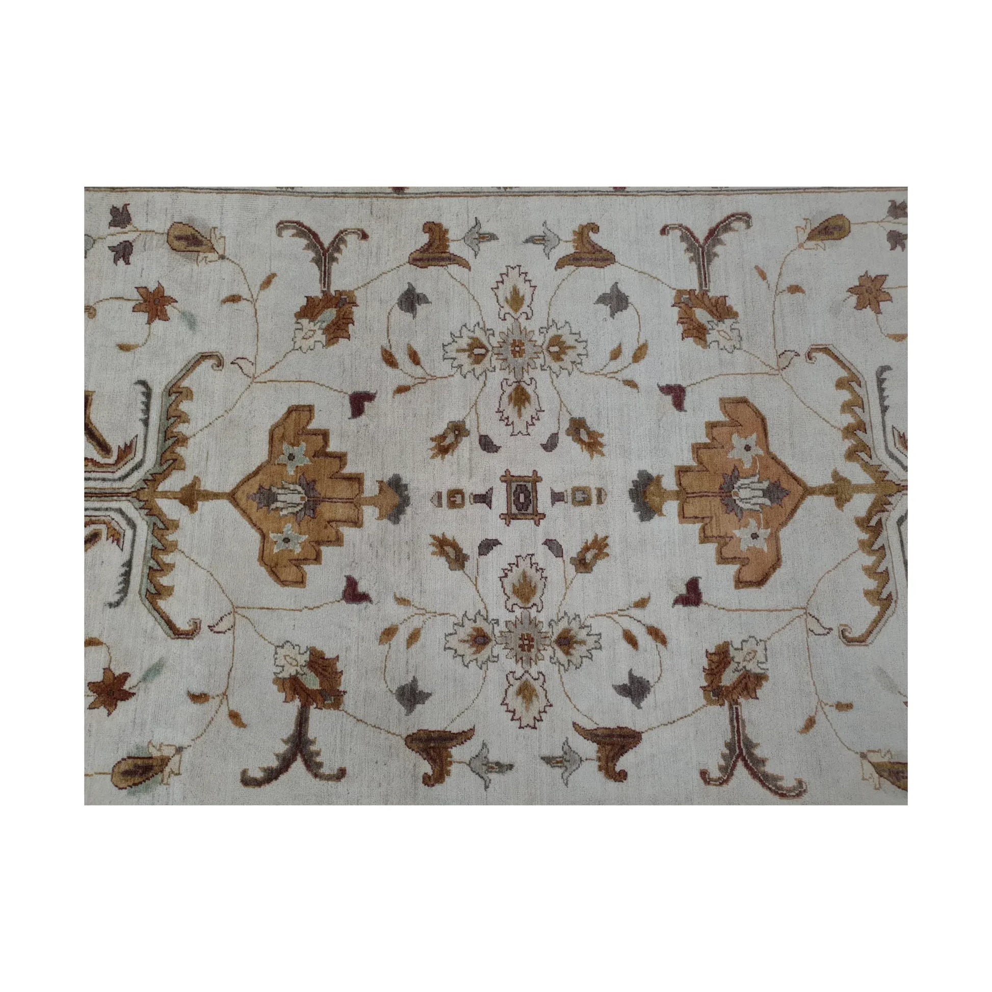 Field detail of Afghan Chobi brown vine rug showing delicate floral motifs