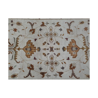 Field detail of Afghan Chobi brown vine rug showing delicate floral motifs