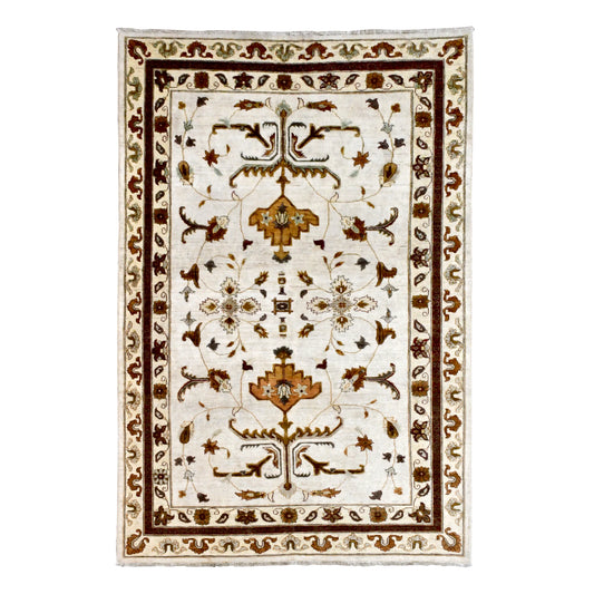 Full view of Afghan Chobi hand-knotted wool rug with ivory field, mirrored brown vines and ochre palmettes, 272 x 179 cm