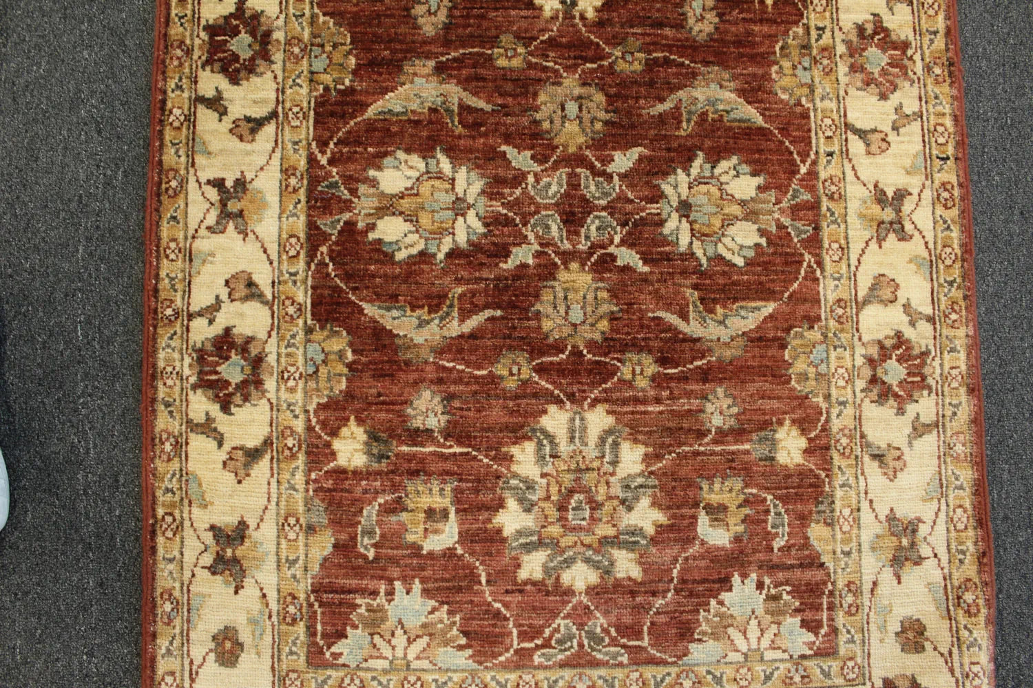Afghan Chobi hand-knotted wool rug 133 x 85 cm field and border detail