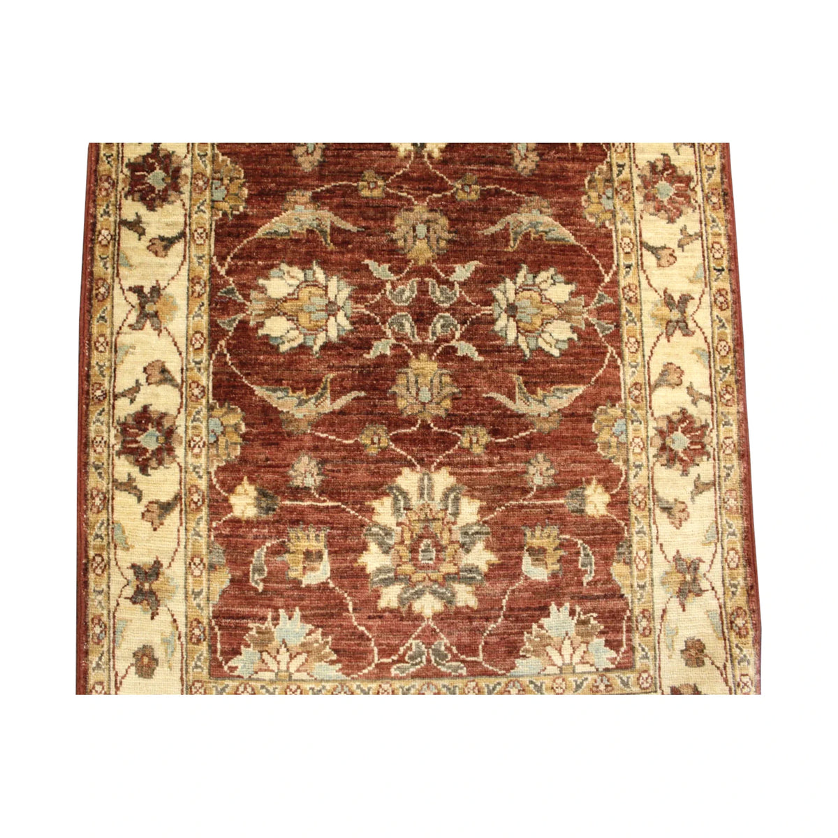 Lower field and side-border detail showing ivory floral motifs across the deep rust-red Chobi wool rug