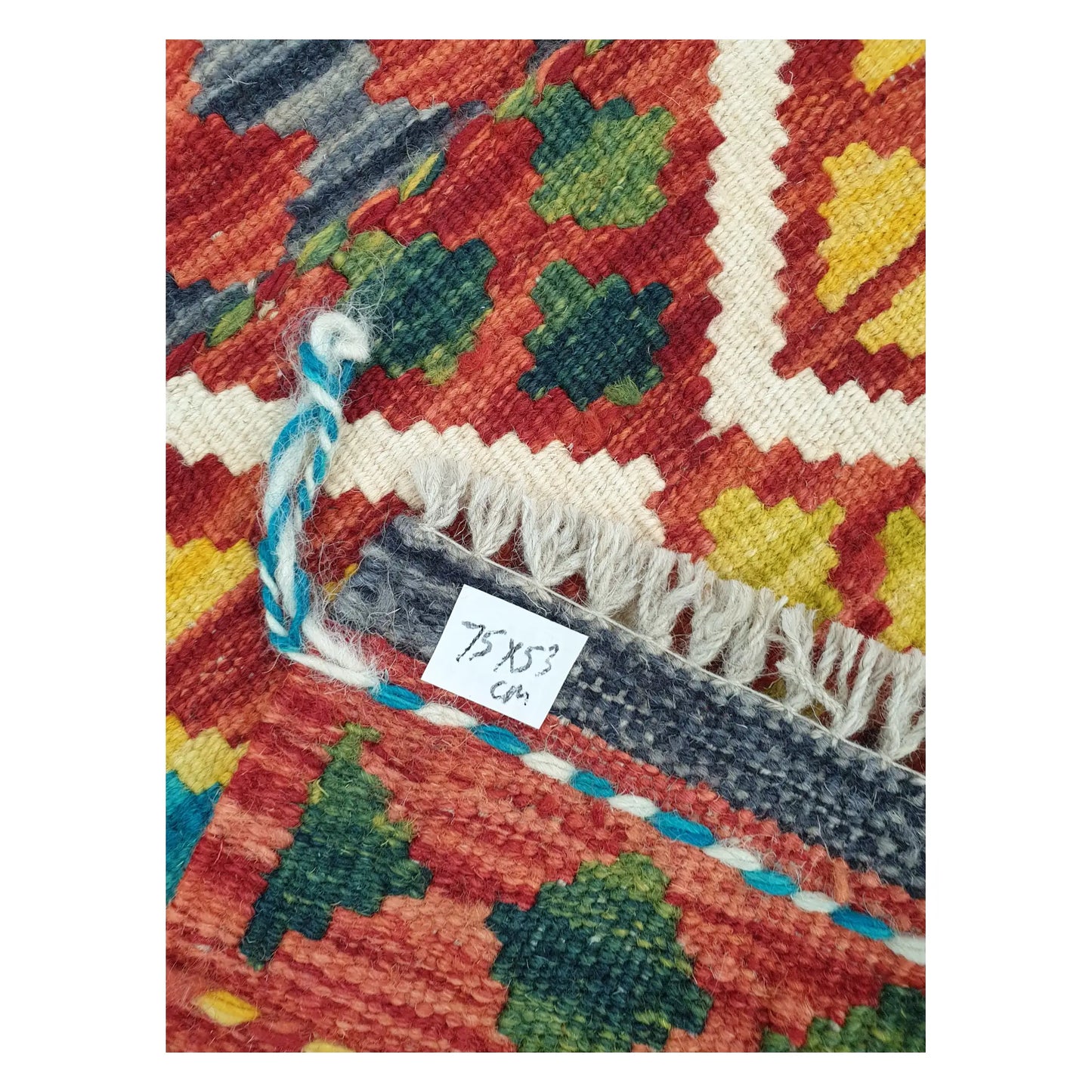 Close-up of Afghan Chobi Kilim wool flatweave texture, fringe, and geometric colour detail, 75 x 53 cm