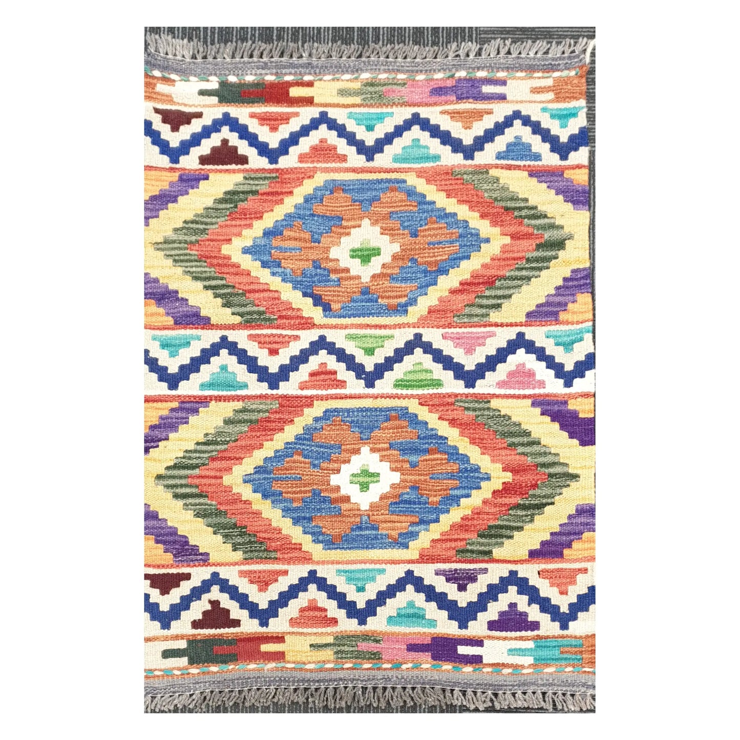Front view of Afghan Chobi Kilim handwoven wool rug with terracotta double diamond design, 85 x 60 cm
