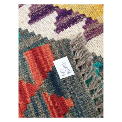 Close-up of Afghan Chobi Kilim wool flatweave texture, fringe, and geometric colour detail, 90 x 58 cm