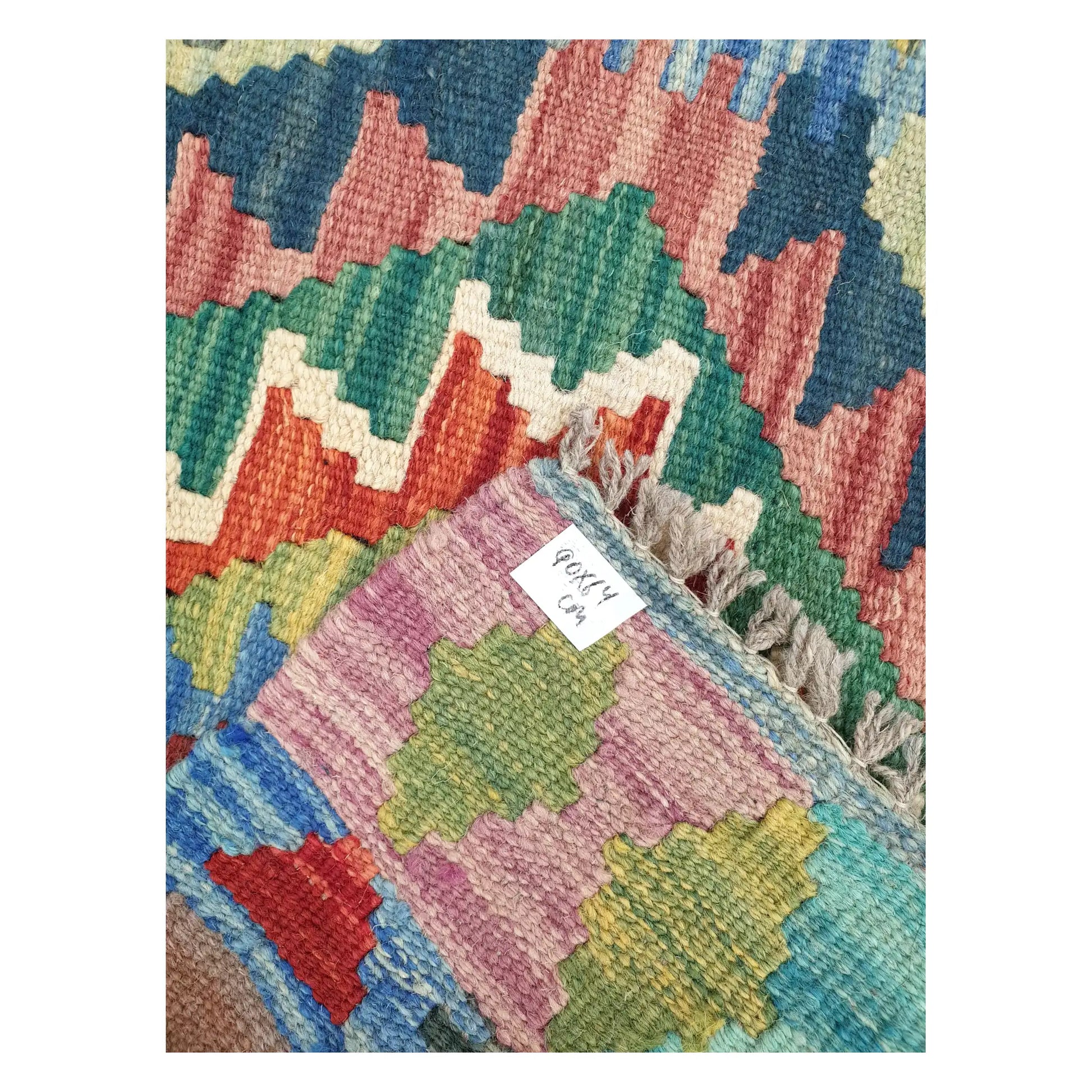 Close-up of Afghan Chobi Kilim wool flatweave texture, fringe, and geometric colour detail, 90 x 64 cm